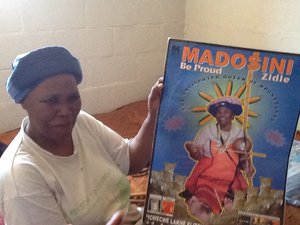 MADOSINI with one of her tour posters