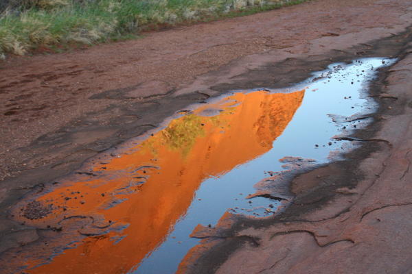 Uluru in puddle