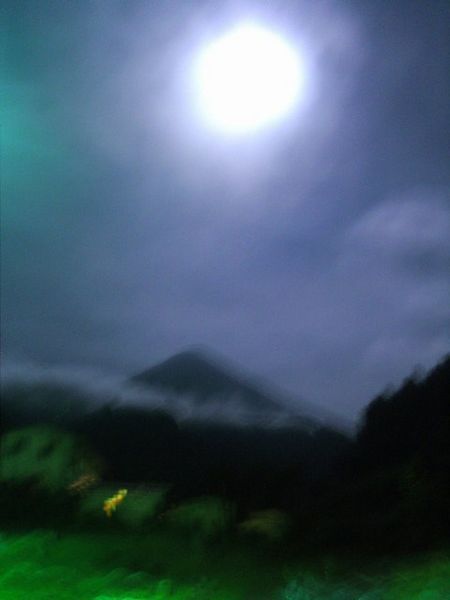 Midnight shot of full moon and the mountian too climb.