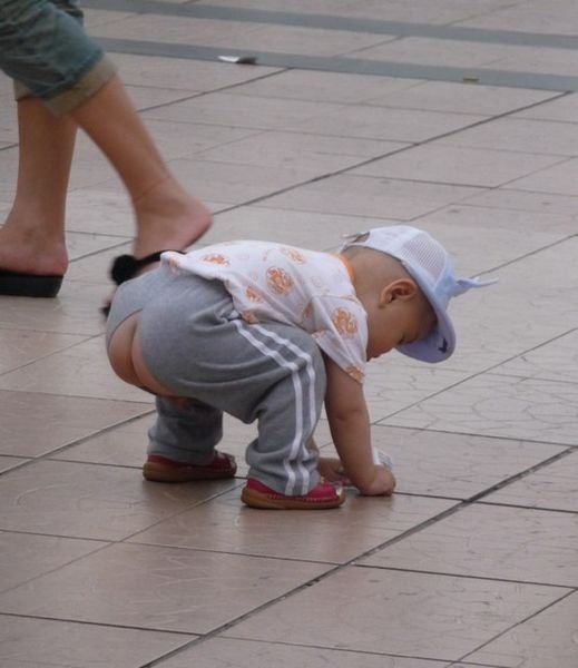 Everywhere in China babies have no crutch or nappies