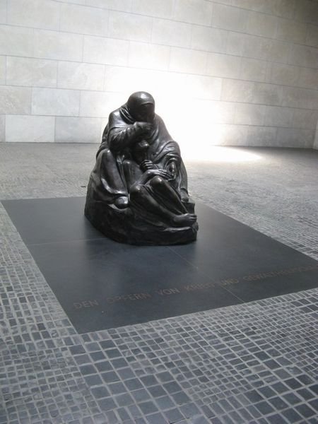 Memorial showing a mother crying.