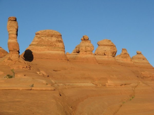 Profile view of Delicate Arch.  It is on the left and cast a shadow.