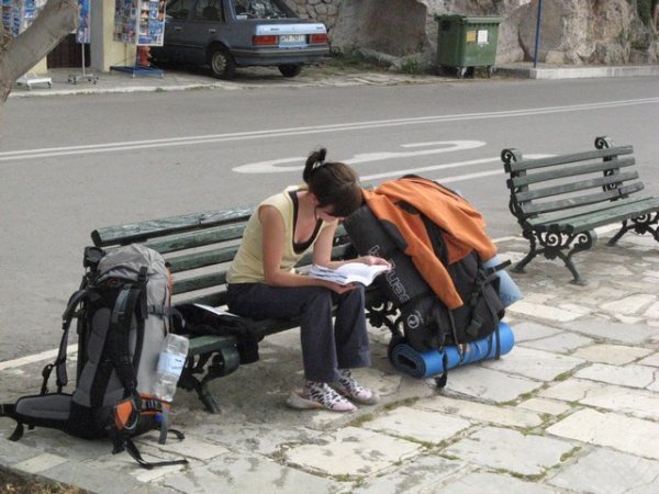 Delphi - Polish Traveler reading her Lonely Planet