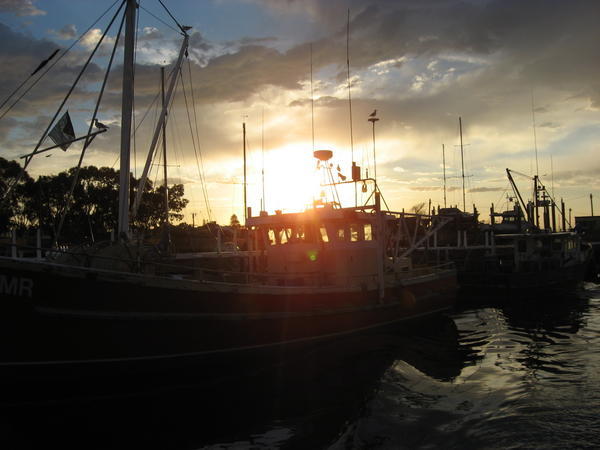 Sunset over fishing boats