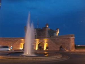 The fountain in Montone at night