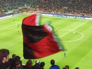huge AC Milan flag at the game
