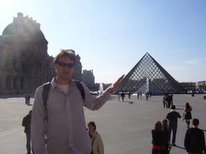 me petting the Pyramid at the Louvre
