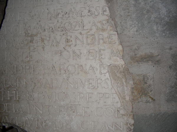 writing on an old stone tablet, of course