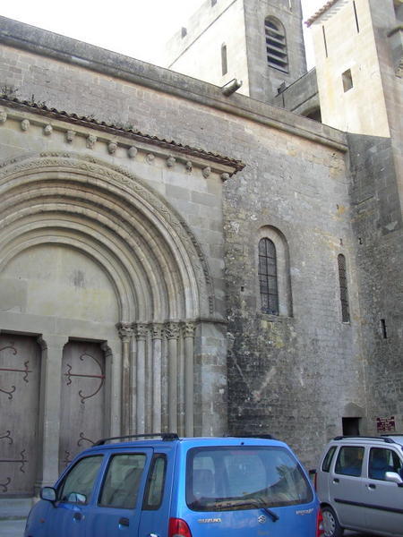 french vehicles in front of the gothic cathedral