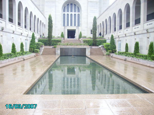 the eternal flame over the pool of rememberance