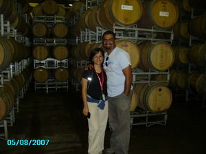 surrounded by barrels of wine