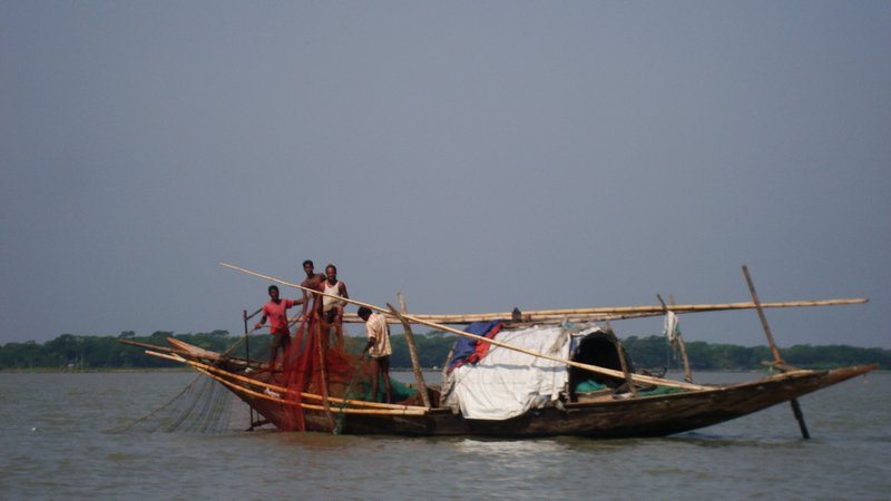 Fishermen pulling in their nets