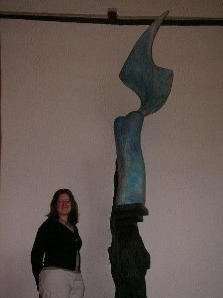 Kerensa standing next to modern art