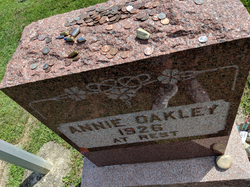 Annie Oakley's tombstone, with bullets