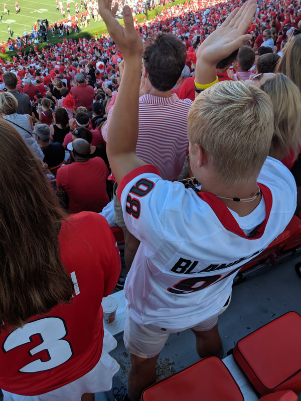 The guy in front of us is happy that the Dawgs woke up in the 2nd quarter
