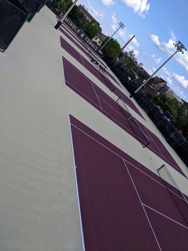 FSU tennis courts in garnet and gold