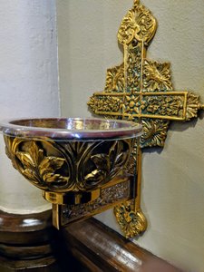bowls of holy water near the door