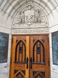 appropriate motto inscribed above the Basilica door