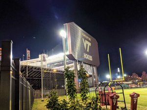 Lane Stadium lit up at night