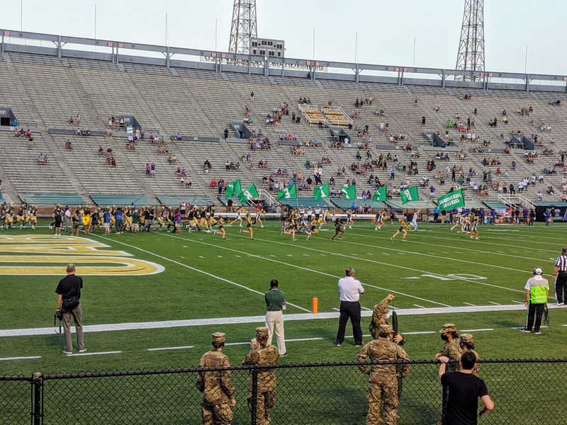 UAB takes the field! Can you see the motorcycle behind the E?