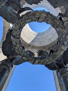 The wreath underneath one of the towers of the WWII Memorial