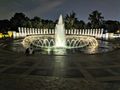 The WW2 Memorial with fountain lit up at night