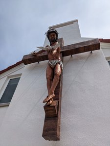 Crucifix on the side of the Church by the Sea