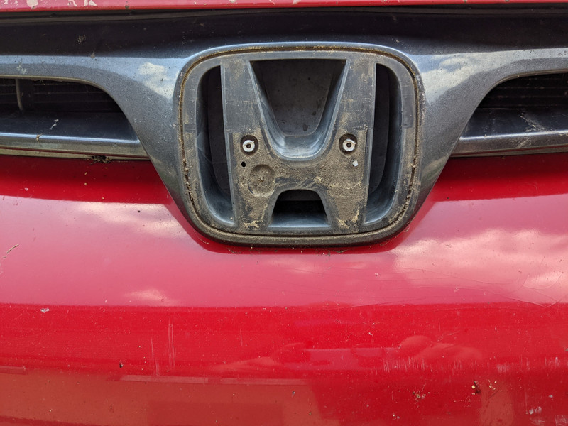 The most obvious cosmetic damage is the loss of the chrome Honda logo