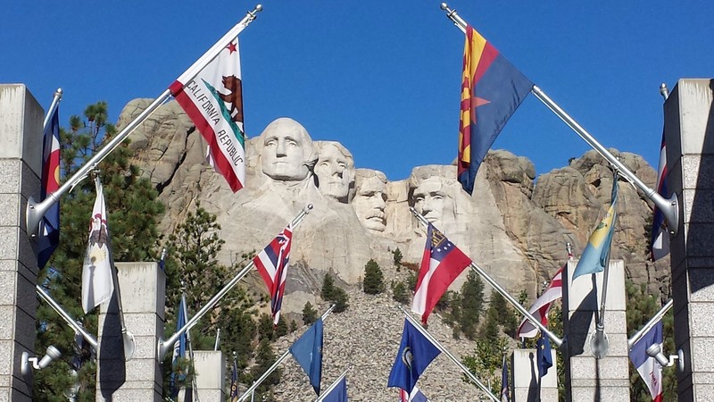 Avenue of Flags leading to Mount Rushmore