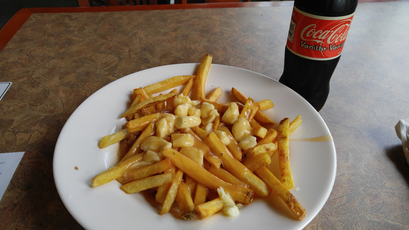 Poutine and a vanilla coke - lunch of Canadian champions