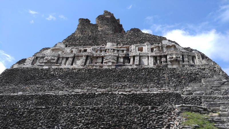 The frieze is just underneath the third level of the Castillo