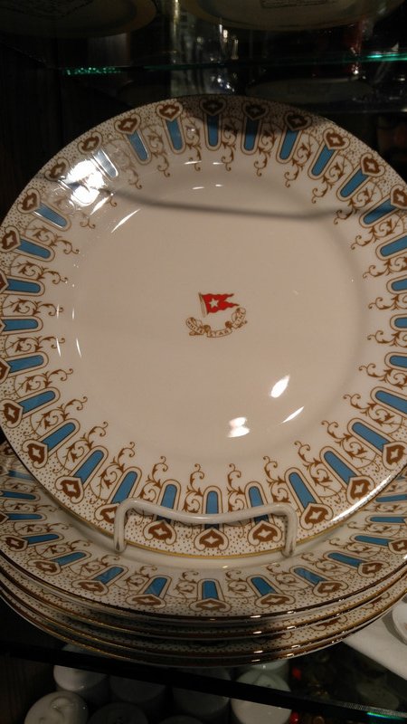 Replica White Star Line plates in the Titanic gift shop
