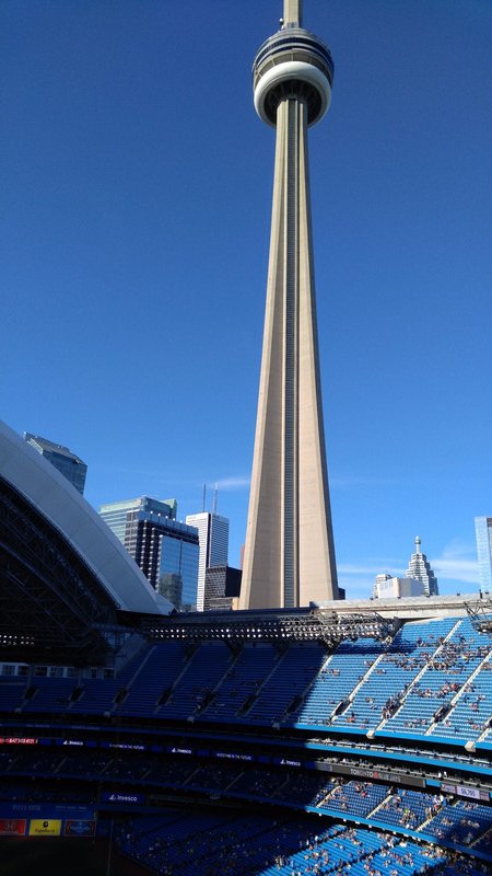 The CN Tower soars above Rogers Centre, the home of the Blue Jays