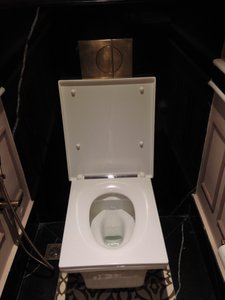 Square toilet in reception area