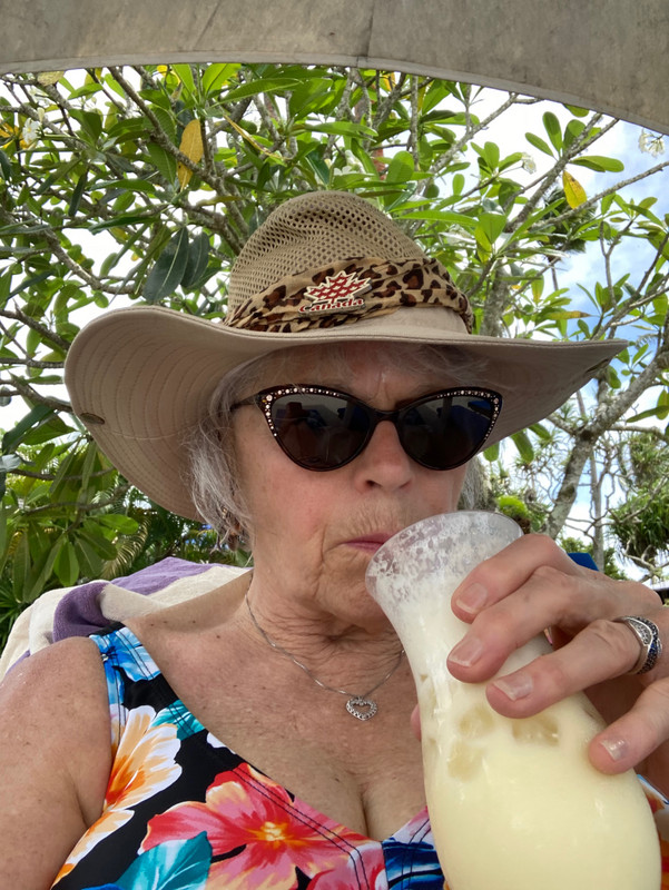 At the pool with a pina colada