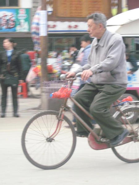 cycling chinese man