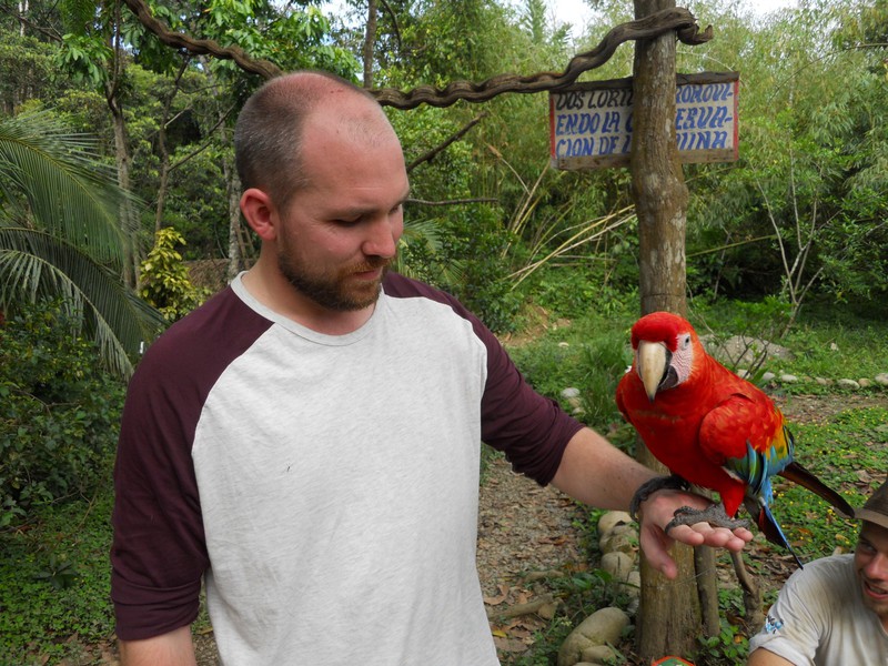 Nick and a macaw