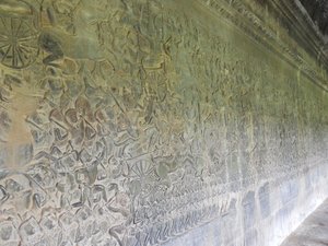 Just one small section of the hundreds of metres of intricately sculpted walls within Angkor Wat