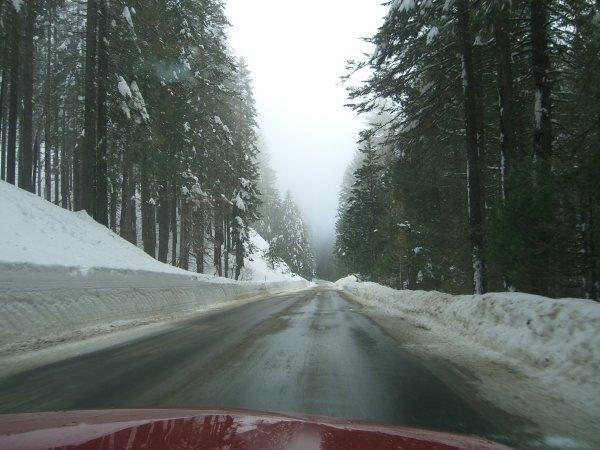 Driving through snowy Yosemite