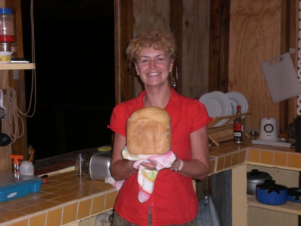 Kate proudly holds her first loaf