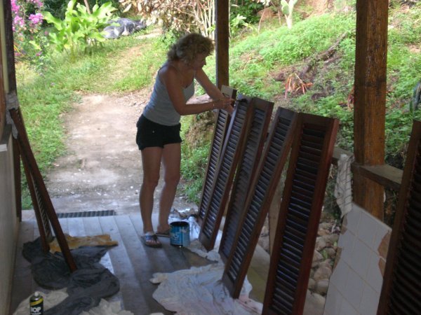 Kate varnishing the shutters