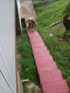 Kate painting our concrete steps