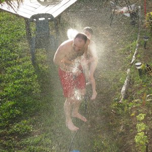 Tha garden hose rinse-off after swimming in the bay