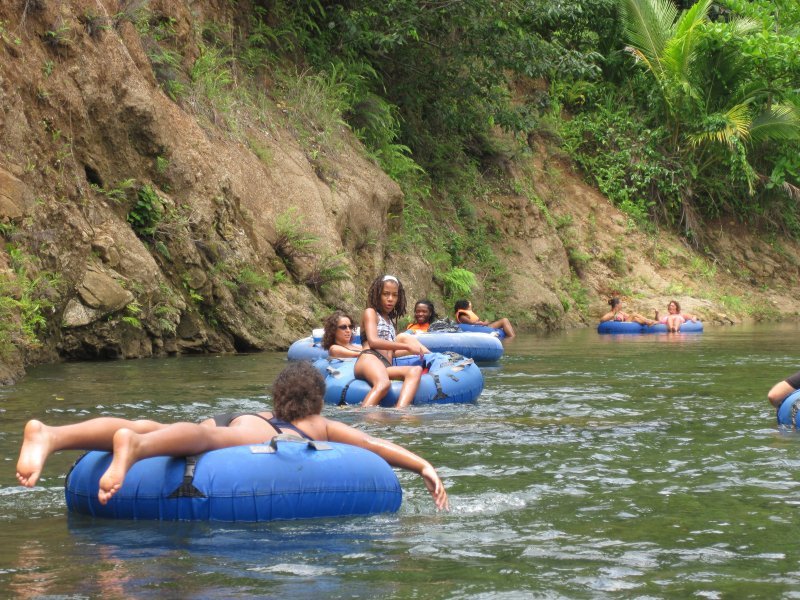 River tubing - Rhiann, Alice and the other floaters on a calm stretch