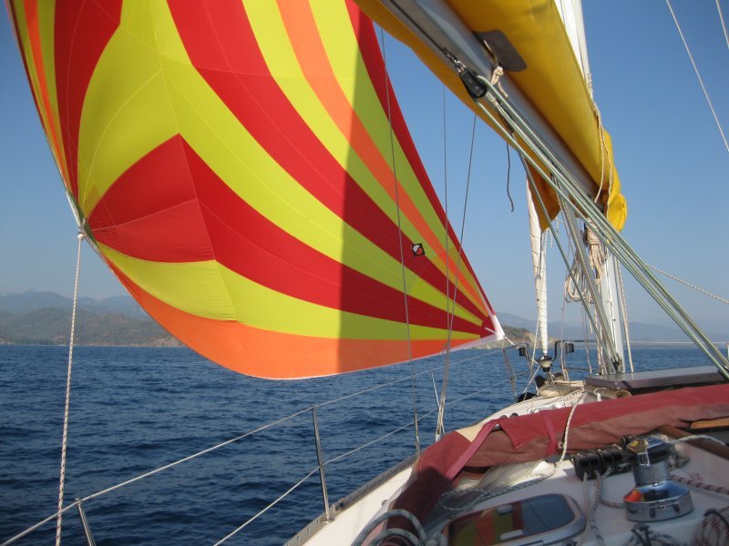 Sailing under cruising chute across the Gulf of Fethiye