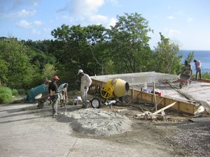 construction project - mixing the concrete by hand on the road after our concrete mixer and then a replacement broke down