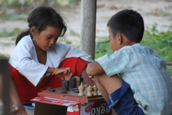 Kids playing chess