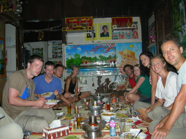 The group digging into a Cambodian feast