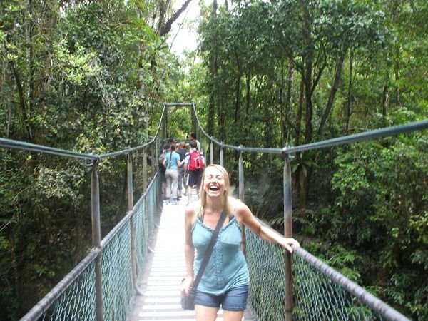 kath on the swinging bridge in the rainforest