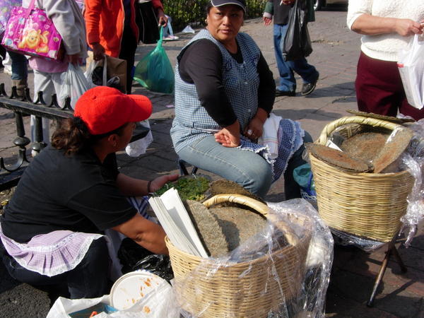 Tortillas sold on street- note the color of the tortillas